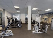 Thumbnail 74 of 82 - Countless fitness machines in our state of the art facility at Trillium Apartments, Fairfax, 22031