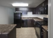 Thumbnail 43 of 82 - Townhomes-Upgraded kitchen with built in microwave at Trillium in Fairfax, VA at Trillium Apartments, Virginia, 22031