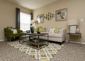Thumbnail 3 of 17 - A living room with a green chair, a white couch, and a coffee table.
