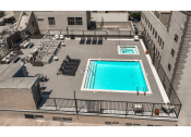 Thumbnail 12 of 18 - an aerial view of a swimming pool on the roof of a building