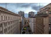 Thumbnail 14 of 18 - a view of a city street from the roof of a building