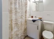Thumbnail 14 of 61 - Bright and clean bathroom
