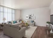 Thumbnail 17 of 61 - Townhome living area with floor to ceiling windows