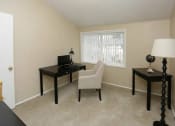 Thumbnail 19 of 61 - Additional bedroom with plush carpeting in townhome