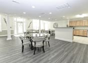 Thumbnail 4 of 28 - Large community room area for residents to enjoy with plenty of seating.