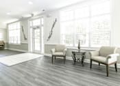 Thumbnail 5 of 28 - Large community room area for residents to enjoy with plenty of seating.