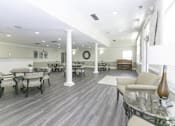 Thumbnail 7 of 28 - Large community room area for residents to enjoy with plenty of seating.
