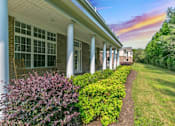 Thumbnail 10 of 28 - Spacious community patio for residents to enjoy the fresh air