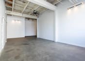 Thumbnail 44 of 57 - an empty room with white walls and a ceiling fan