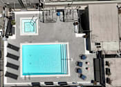 Thumbnail 18 of 24 - an aerial view of a swimming pool on the roof of a building