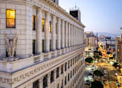 Thumbnail 21 of 24 - a large white building with a statue on the side of it