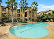Thumbnail 1 of 34 - Sun sparkling swimming pool at Stonehaven Apartments in Houston, TX