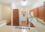 Thumbnail 21 of 34 - Open concept kitchen with plenty of counter space at Stonehaven Apartments in Houston, TX
