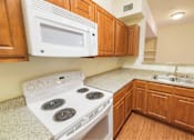 Thumbnail 20 of 34 - Kitchen with microwave at Stonehaven Apartments in Houston, TX