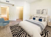 Thumbnail 4 of 34 - Large bedroom with plush carpeting  at Stonehaven Apartments in Houston, TX