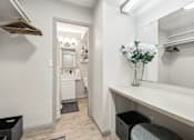 Thumbnail 13 of 50 - Large vanity area outside of the chic bathroom at Archer Tower in Denver, CO