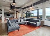 Thumbnail 40 of 50 - Penthouse entertainment lounge with comfortable seating at Archer Tower in Denver, CO