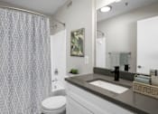 Thumbnail 8 of 32 - Modern bathroom with vanity sat The Crossings at Russett in Laurel, MDtorage