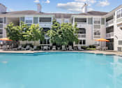 Thumbnail 10 of 32 - Resort-style pool with sun deck at The Crossings at Russett in Laurel, MD