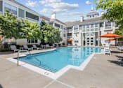 Thumbnail 22 of 32 - Resort-style pool with sun deck at The Crossings at Russett in Laurel, MD