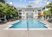 Thumbnail 1 of 32 - Resort-style pool with sun deck at The Crossings at Russett in Laurel, MD