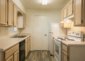 Thumbnail 12 of 41 - Kitchen with rich light wood cabinetry