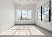 Thumbnail 21 of 57 - A room with a large window and a tiled floor.