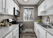 Thumbnail 2 of 24 - Large one bedroom kitchen