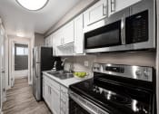 Thumbnail 16 of 24 - One bedroom kitchen