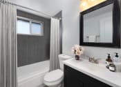 Thumbnail 19 of 24 - Bathroom in one bedroom