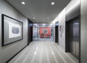 Thumbnail 69 of 82 - Elevator waiting area between our business and fitness center at Trillium Apartments, Fairfax, VA, 22031