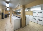Thumbnail 78 of 82 - On-site clothes care center at Trillium Apartments, Fairfax