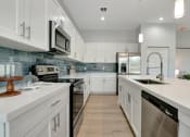 Thumbnail 14 of 37 - 3 Bedroom Coastal-Style Single Family Home for Rent in The Treasure Coasts steel appliances