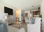 Thumbnail 2 of 41 - a living room with couches and a coffee table at Sonder House, Brooklyn Center, Minnesota