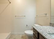 Thumbnail 16 of 41 - a bathroom with a toilet and a bathtub at Sonder House, Minnesota, 55430