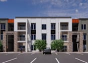 Thumbnail 11 of 44 - A room with a white door and a window showing a view of a residential area at Sonder Point 50+ Apartments, Brooklyn Center