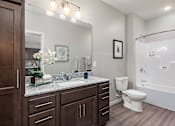 Thumbnail 16 of 40 - Bathroom With Bathtub at Decatur Landing I & II, Brooklyn Park, MN