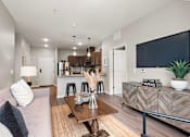 Thumbnail 11 of 40 - Living Room With Kitchen View at Decatur Landing I & II, Brooklyn Park Minnesota