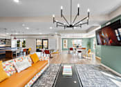 Thumbnail 32 of 40 - Clubroom With TV at Decatur Landing I & II, Brooklyn Park Minnesota
