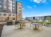 Thumbnail 22 of 40 - Outdoor Patio And Grill at Decatur Landing I & II, Brooklyn Park, MN 55445