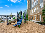 Thumbnail 19 of 40 - A playground at Decatur Landing I & II, Brooklyn Park