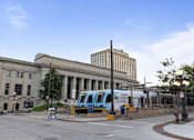 Thumbnail 21 of 21 - A city bus is parked at Parkside Apartments, St. Paul, 55101