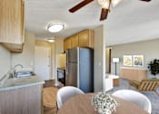 Thumbnail 14 of 14 - Kitchen Along with Living Area at Northtown Village Apartments, Spring Lake Park Minnesota