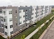Thumbnail 47 of 51 - an aerial view of an apartment building on a city street at Technology Park Apartments, Rochester, MN