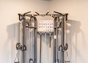 Thumbnail 18 of 51 - a fitness room with cardio equipment in a home gym at Technology Park Apartments, Rochester, 55901
