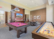 Thumbnail 31 of 44 - a game room with two pool tables and a billiard table at The Winslow 62+ Apartments, West St Paul