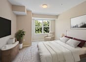 Thumbnail 19 of 44 - an image of a bedroom with a bed and a tv at The Winslow 62+ Apartments, West St Paul, MN, 55118