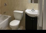 Thumbnail 8 of 57 - a bathroom with a toilet sink and a shower