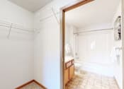 Thumbnail 20 of 31 - master walk in closet and bath