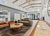 Thumbnail 67 of 83 - Audenn apartments in bloomington mn with shuffleboard table at Audenn Apartments, Bloomington, MN